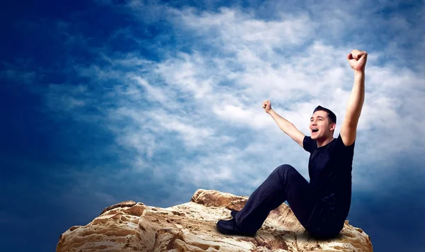 Man on the top of mountain. Stock Image