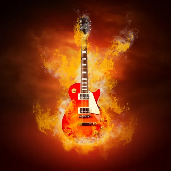 Rock guita in flames of fire Royalty Free Stock Images