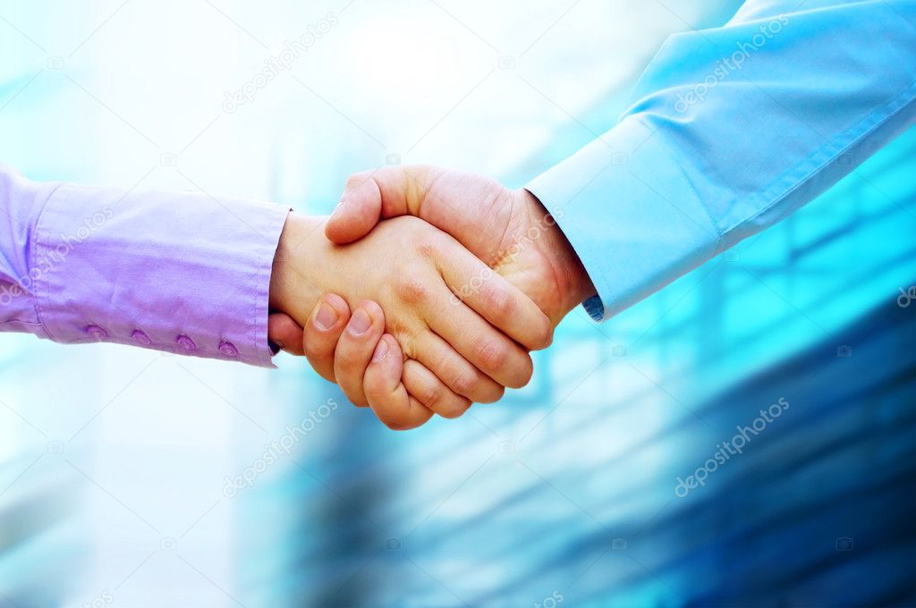 Shaking hands of two business