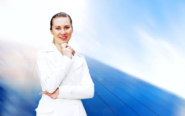 Happiness businesswoman on the business architecture background — Stock Photo, Image