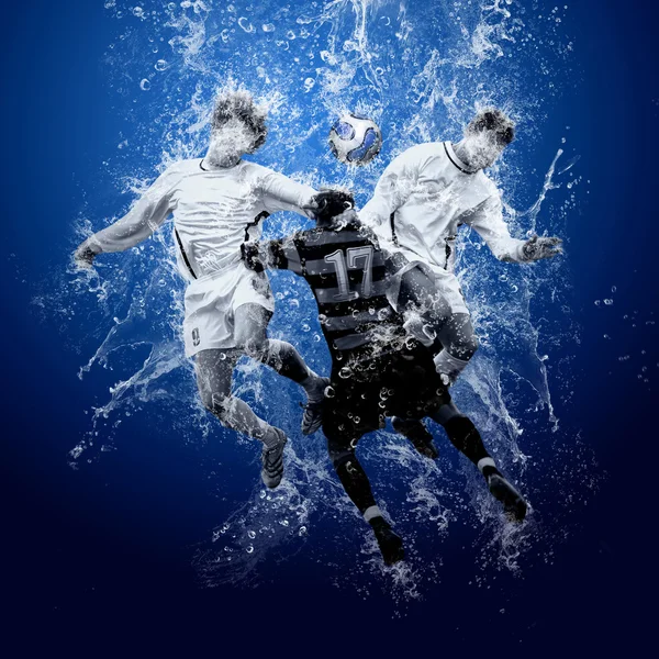 水滴の周りのサッカー選手 — ストック写真