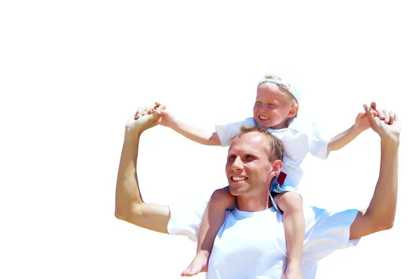 Joyful father giving piggyback ride to his son against a white b — Stock Photo, Image
