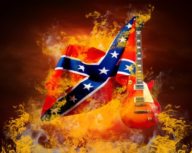 Yangın alevleri etrafında Rock bayrağı