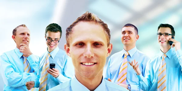 Grupp av lycka businessmans på den vita bakgrunden — Stockfoto