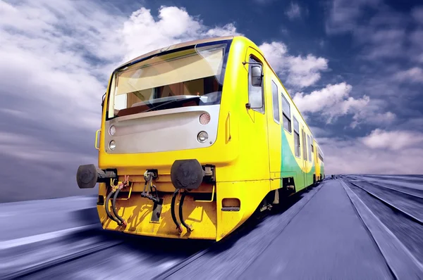 Yellow train on speed outdoor — Stock Photo, Image