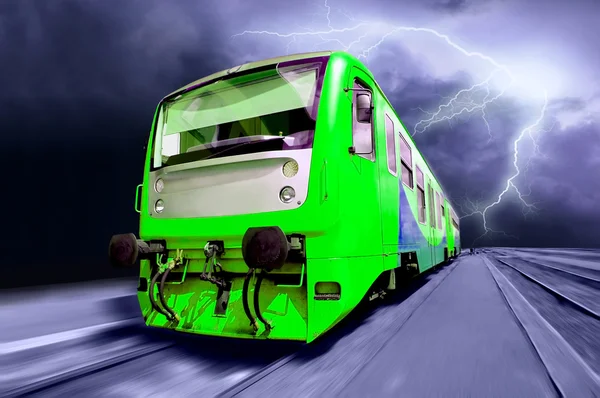 Green train on speed outdoor — Stock Photo, Image