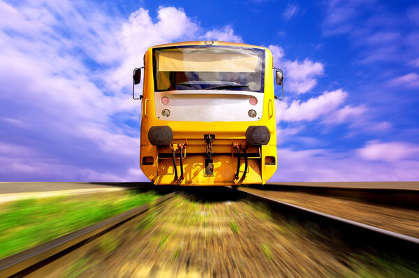 Yellow train on speed outdoor