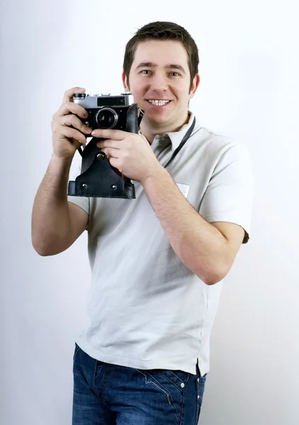 Vintage fotoğraf makinesi ile mutluluk adam. — Stok fotoğraf