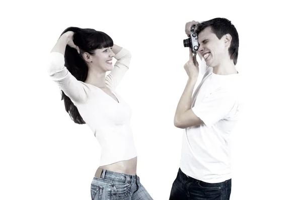 Jovem casal de beleza com câmera fotográfica isolada no backgrou branco — Fotografia de Stock