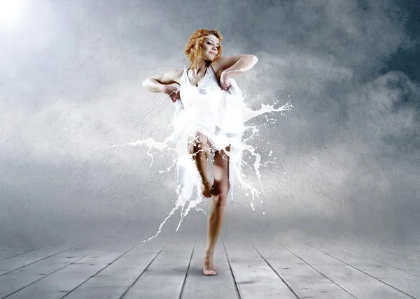 Dance of ballerina with dress of milk — Stock Photo, Image