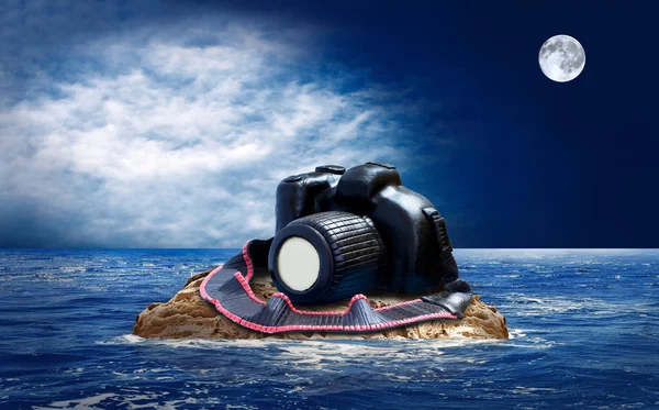 stock image Cake from chocolate photocamera on the island in sea.