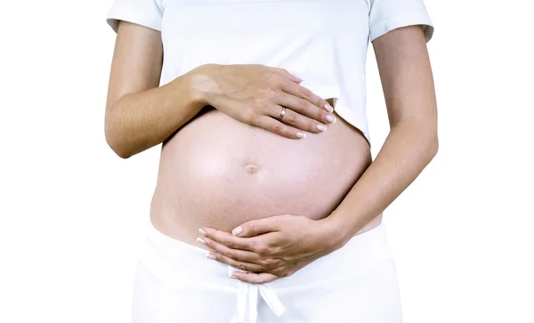 Счастье беременных женщин в белом — стоковое фото