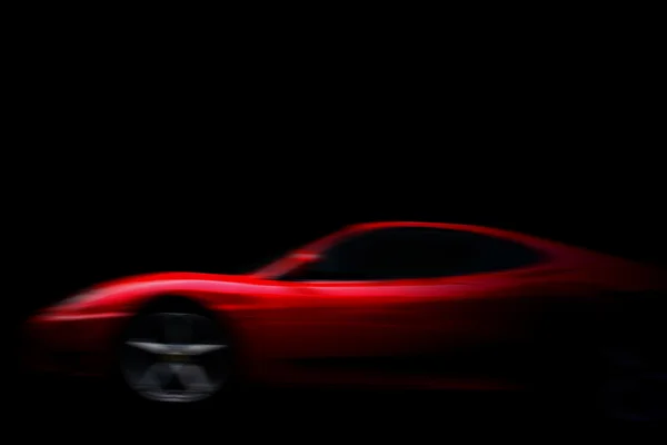 Belo carro esporte vermelho em preto — Fotografia de Stock