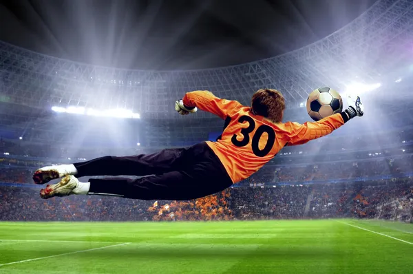 Football goalman on the stadium field — Stock Photo, Image