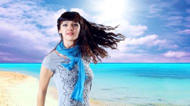 Young beatiful caucasian women with hair on the wind at sunny tr clipart