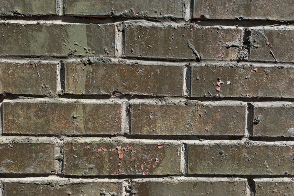 The Wall from a facing gray brick