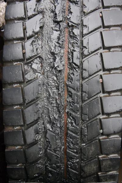 Melted truck tire — Stock Photo, Image
