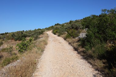 Mountain gravel road clipart