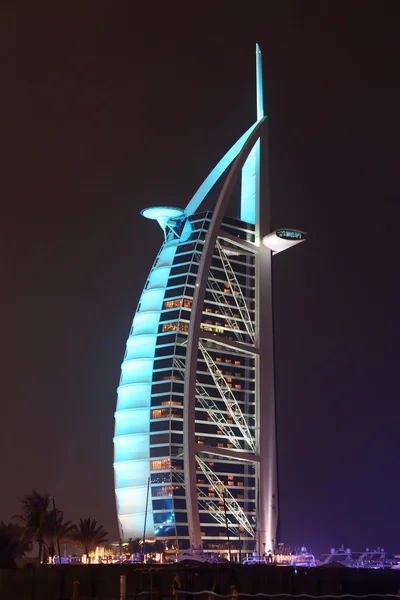 Burj Al Arab hotel illuminated at night. Dubai — Stock Photo, Image