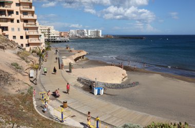 Promenade at the beach of El Medano, Canary Island Tenerife, Spain. Photo t clipart