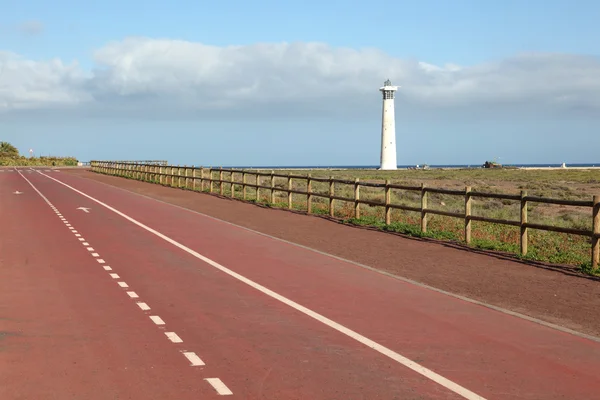 Trilha de bicicleta e atletismo em Jandia Playa, Canary Island Fuerteventura , — Fotografia de Stock