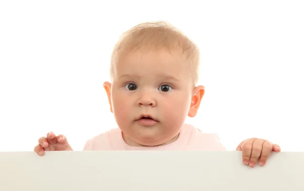 Cute baby girl holding empty white board — Stock Photo, Image