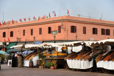 Market stands at Djemaa el Fna place in Marrakech, Morocco clipart