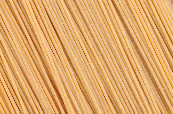Tło razowego spaghetti — Zdjęcie stockowe