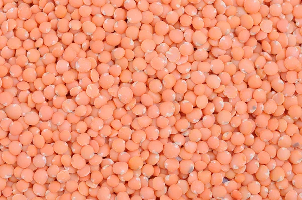 Vermelho lentilhas divididas fundo — Fotografia de Stock