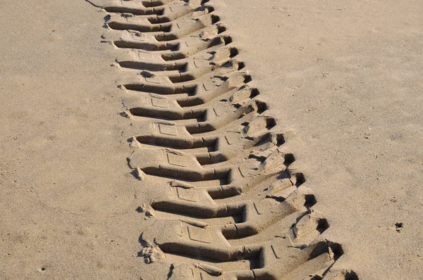 Tyre track in the sand — Stock Photo, Image