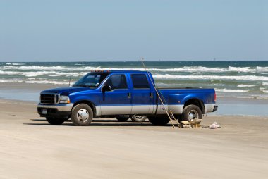 Pickup truck on the beach clipart