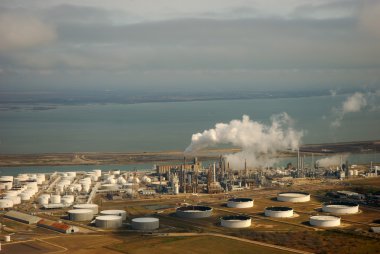 Aerial view of liquid storage tanks and the coast in Corpus Christi, Texas clipart