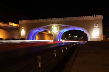 Gate to Muttrah, at night. Oman clipart