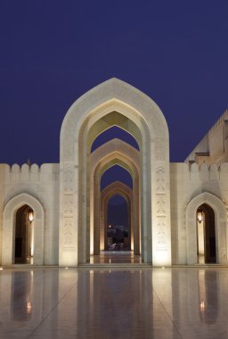 Sultan Qaboos Grand Mosque at night. Muscat, Oman clipart