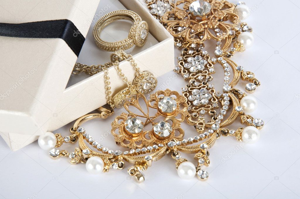 Box with Jewelry on a white background. Jewel. Pearl. Gold ring