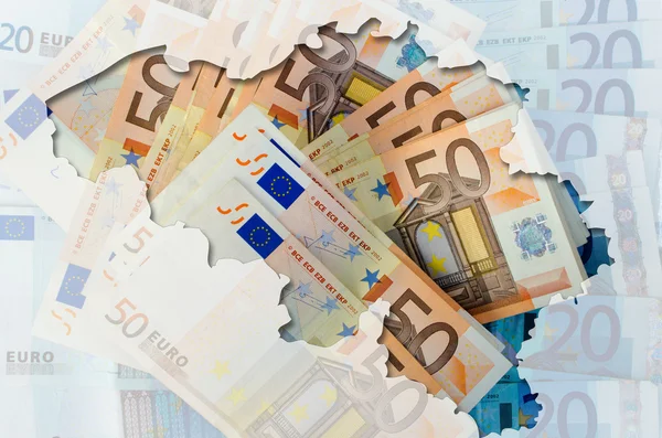 Umrisskarte von Belgien mit transparenten Euro-Banknoten im Hintergrund — Stockfoto