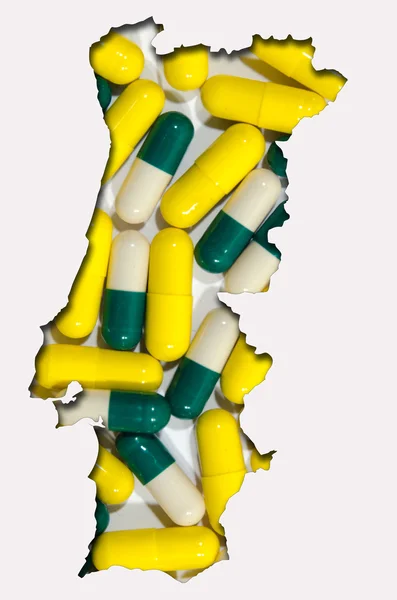 Outline map of Portugal with pills in background — Stock Photo, Image