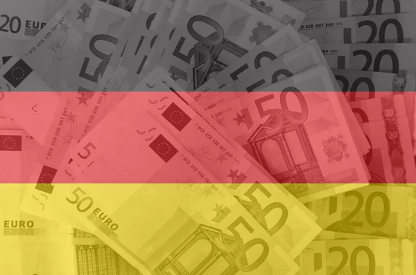 バック グラウンドで透明のユーロ紙幣とドイツの旗 — ストック写真