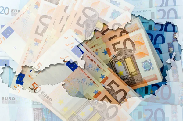 Περίγραμμα της Αυστρίας με διαφανή τραπεζογραμμάτια ευρώ στην έκφραση — Φωτογραφία Αρχείου