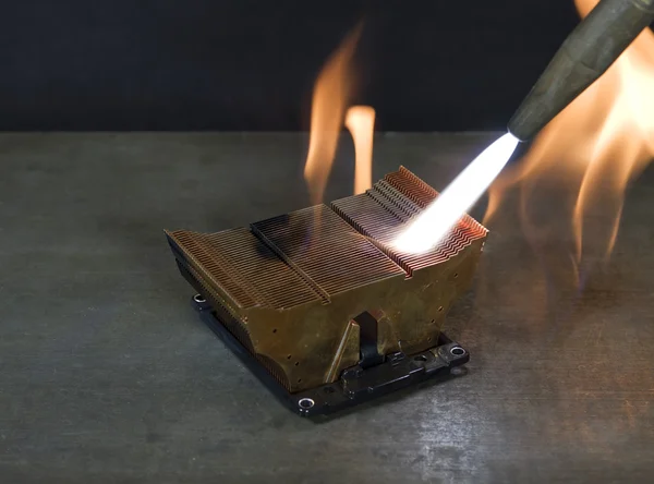 Burning a cooling element — Stock Photo, Image