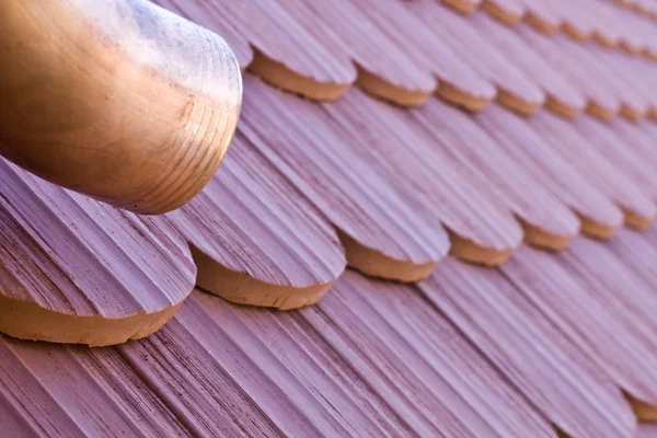 Roof tile with part of eaves gutter — Stock Photo, Image