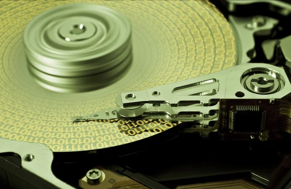 Hard disk drive with yellow data — Stock Photo, Image