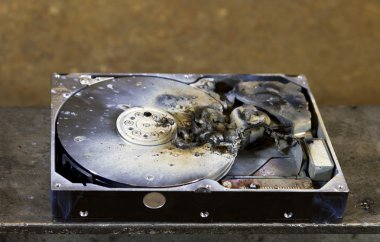 Dead hard drive in close up clipart