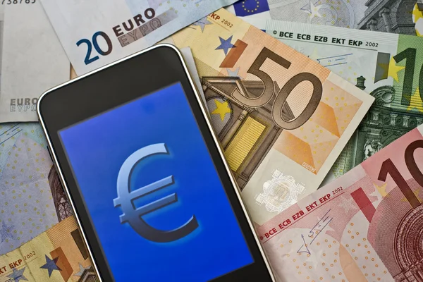 Simbolo euro su palmare — Foto Stock