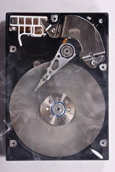 Hard disk drive with smoke — Stock Photo, Image