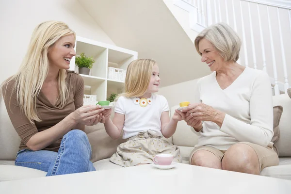 Mother Daughter Grandmother Generations Home Playing wih Tea Set — Stock Photo, Image