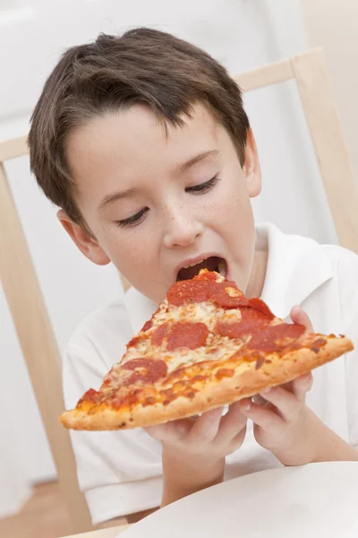 stock image Young Boy Child Eating Slice of Pizza