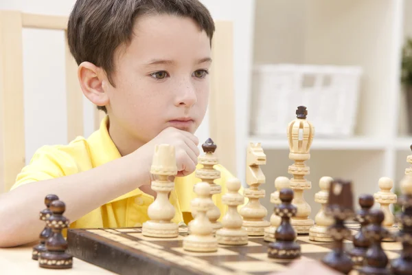 Thoughtful Young Boy Playing Chess — Stock Photo, Image