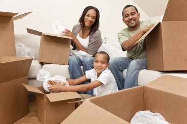 African American Family Unpacking Boxes Moving House clipart