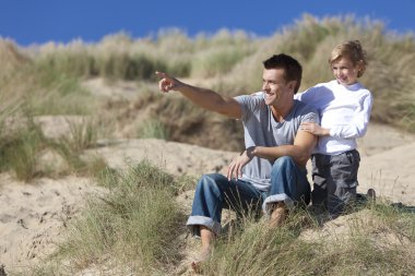 Man & Boy, Father and Son Having Fun At Beach clipart